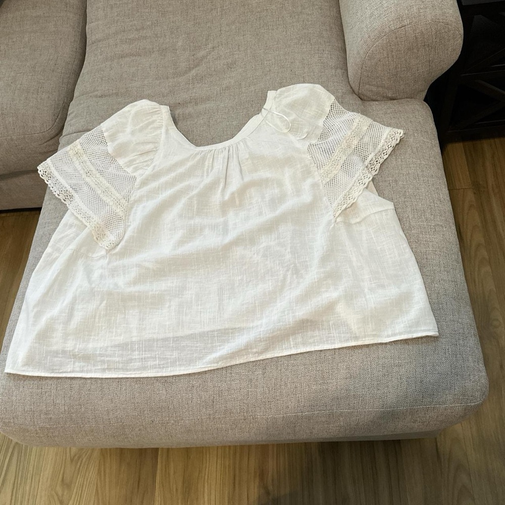 White flowy short sleeved top